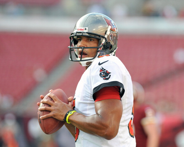 TAMPA, FL -  AUGUST 29:  Quarterback Josh Freeman #5 of the Tampa Bay Buccaneers warms up for play against the Washington Redskins August 29, 2013 at Raymond James Stadium in Tampa, Florida.