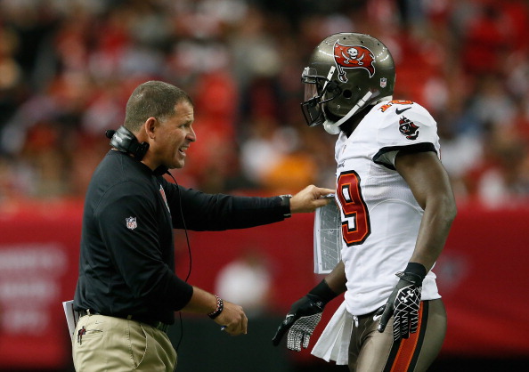 ATLANTA, GA - OCTOBER 20:  Head coach Greg Schiano of the Tampa Bay Buccaneers converses with Mike Williams #19 during the game against the Atlanta Falcons at Georgia Dome on October 20, 2013 in Atlanta, Georgia.  (Photo by Kevin C. Cox/Getty Images)