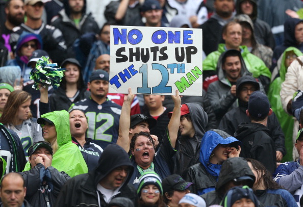 SEATTLE, WA - OCTOBER 14: Fans cheer during the game between the Seattle Seahawks against the New England Patriots at CenturyLink Field on October 14, 2012 in Seattle, Washington. The Seahawks defeated the Patriots 24-23. (Photo by Otto Greule Jr/Getty Images)