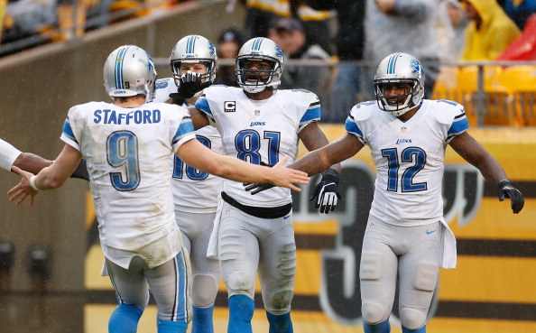 PITTSBURGH, PA - NOVEMBER 17: Calvin Johnson #81 of the Detroit Lions celebrates a second quarter touchdown with Matthew Stafford #9 and Jeremy Ross #12 while playing the Pittsburgh Steelers at Heinz Field on November 17, 2013 in Pittsburgh, Pennsylvania.  (Photo by Gregory Shamus/Getty Images)