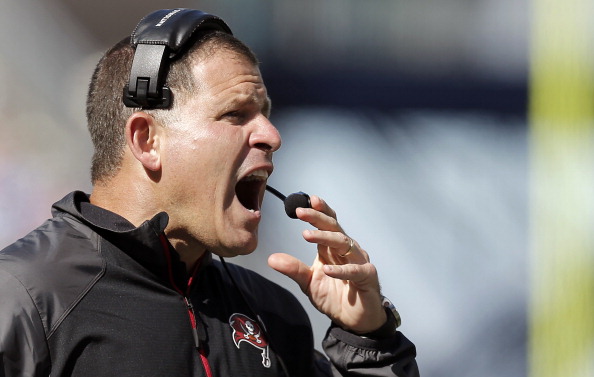 FOXBORO, MA - SEPTEMBER 22:  Head coach Greg Schiano of the Tampa Bay Buccaneers shouts at a referee during the fourth quarter of their 23-3 loss to the New England Patriots at Gillette Stadium on September 22, 2013 in Foxboro, Massachusetts.  (Photo by Winslow Townson/Getty Images)