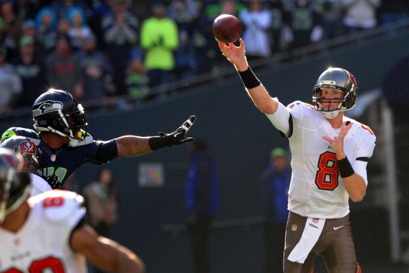 SEATTLE, WA - NOVEMBER 03: Quarterback Mike Glennon #8 of the Tampa Bay Buccaneers passes the ball during the second quarter of the game at CenturyLink Field on November 3, 2013 in Seattle, Washington. (Photo by Steve Dykes/Getty Images)