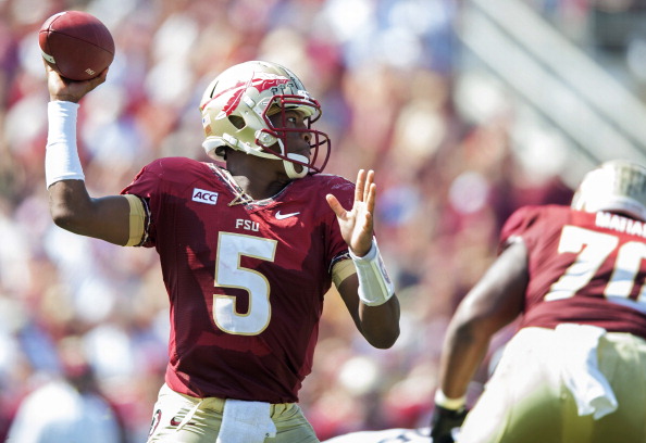 TALLAHASSEE, FL - OCTOBER 5: Jameis Winston #5 of the  Florida State Seminoles winds up for a pass against the Maryland Terrapins during the first half on October 5, 2013 at Doak Campbell Stadium in Tallahassee, Florida. The Seminoles went to beat the Terrapins 63-0. (Photo by Jeff Gammons/Getty Images)
