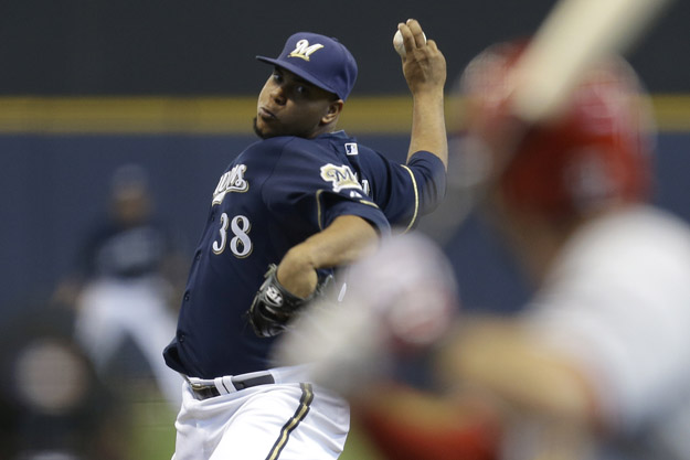 MILWAUKEE, WI - APRIL 16: Wily Peralta #38 of the Milwaukee Brewers pitches during the fourth inning against the St. Louis Cardinals at Miller Park on April 16, 2014 in Milwaukee, Wisconsin. 