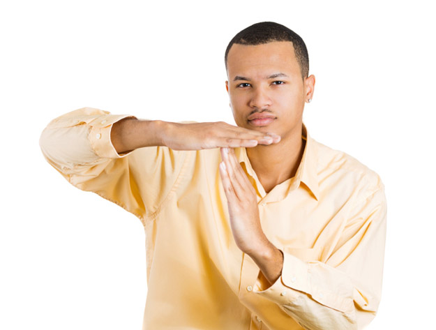 Man showing time out gesture