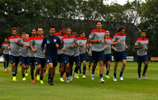 SAO PAULO, BRAZIL - JUNE 09:  The US Men's National Team jogs during their training session at Sao Paulo FC on June 9, 2014 in Sao Paulo, Brazil. 
