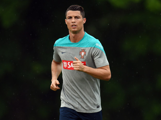 Portugal's Cristiano Ronaldo jogs laps during training June 3, 2014 in Florham Park, New Jersey.  The team will be training at the New York Jets training facility during a stop on their way to the World Cup in Brazil. 