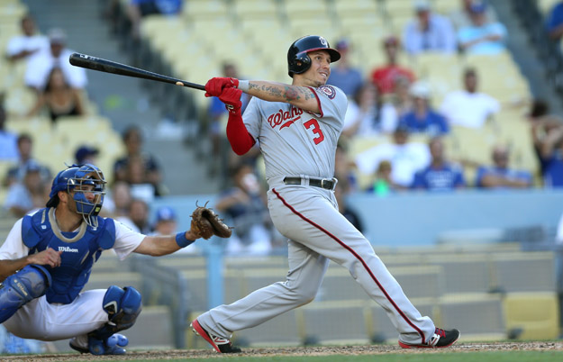 LOS ANGELES, CA - SEPTEMBER 03:  Asdrubal Cabrera #3 of the Washington Nationals hits a two run home run in the 14th inning against the Los Angeles Dodgers at Dodger Stadium on September 3, 2014 in Los Angeles, California.