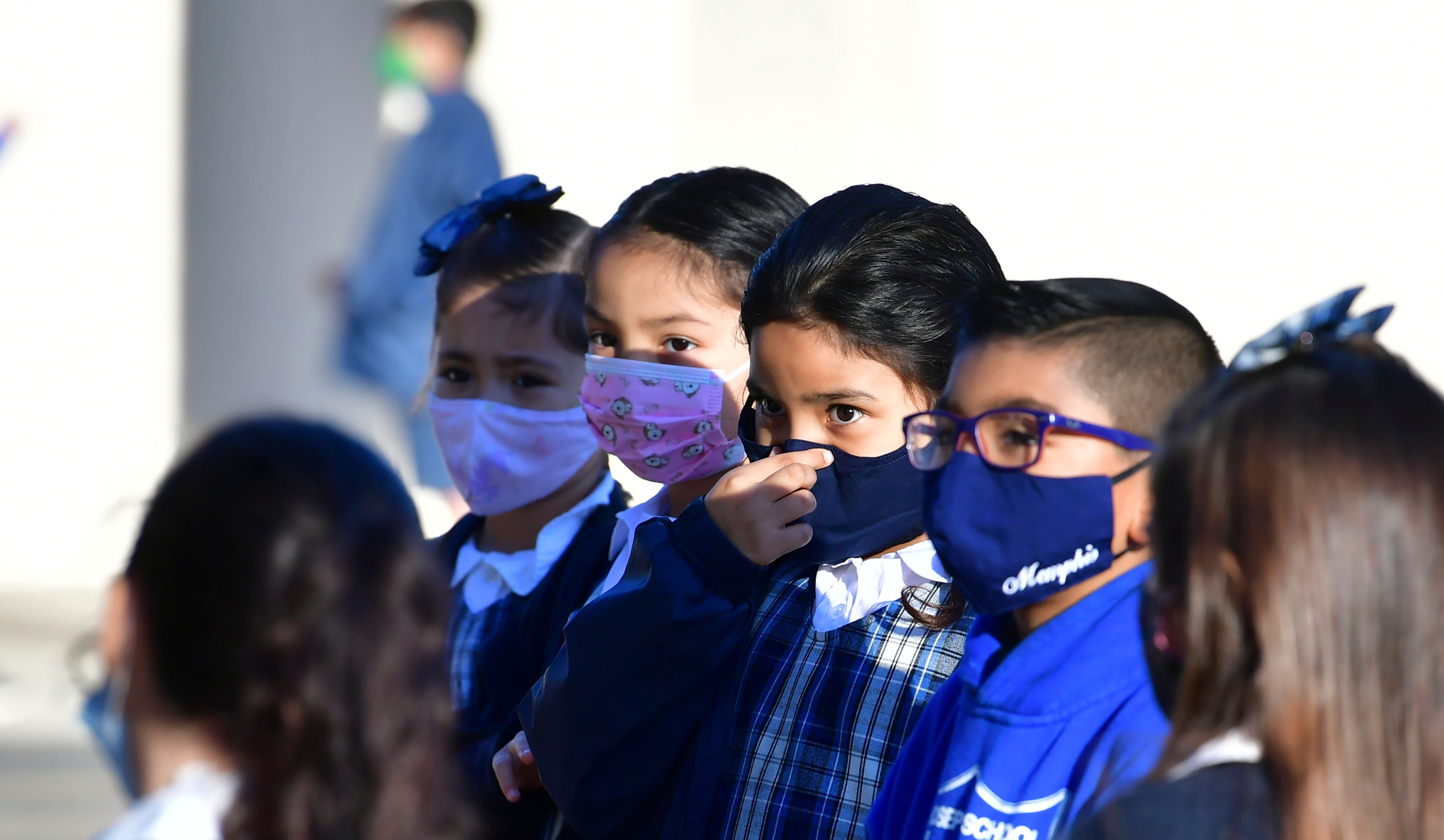 School children wear masks during COVID-19 pandemic